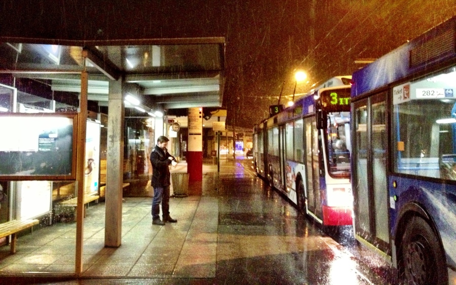 Weather-proof waiting: Weather is unpredicable in this mountain city... so bus shelters have wide roofs to provide plenty of shelter for waiting passengers